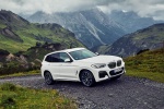 2020 BMW X3 xDrive30e PHEV AWD in Alpine White - Driving Front Right View